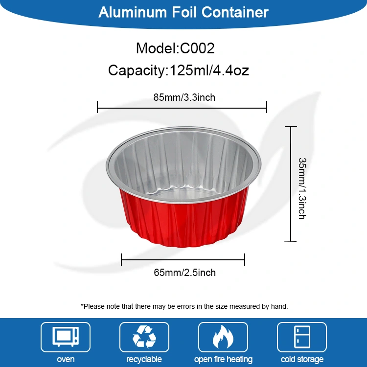 Bakar batean labean egindako cupcake koloretsuak. Smoothwall aluminiozko paperezko ontziak